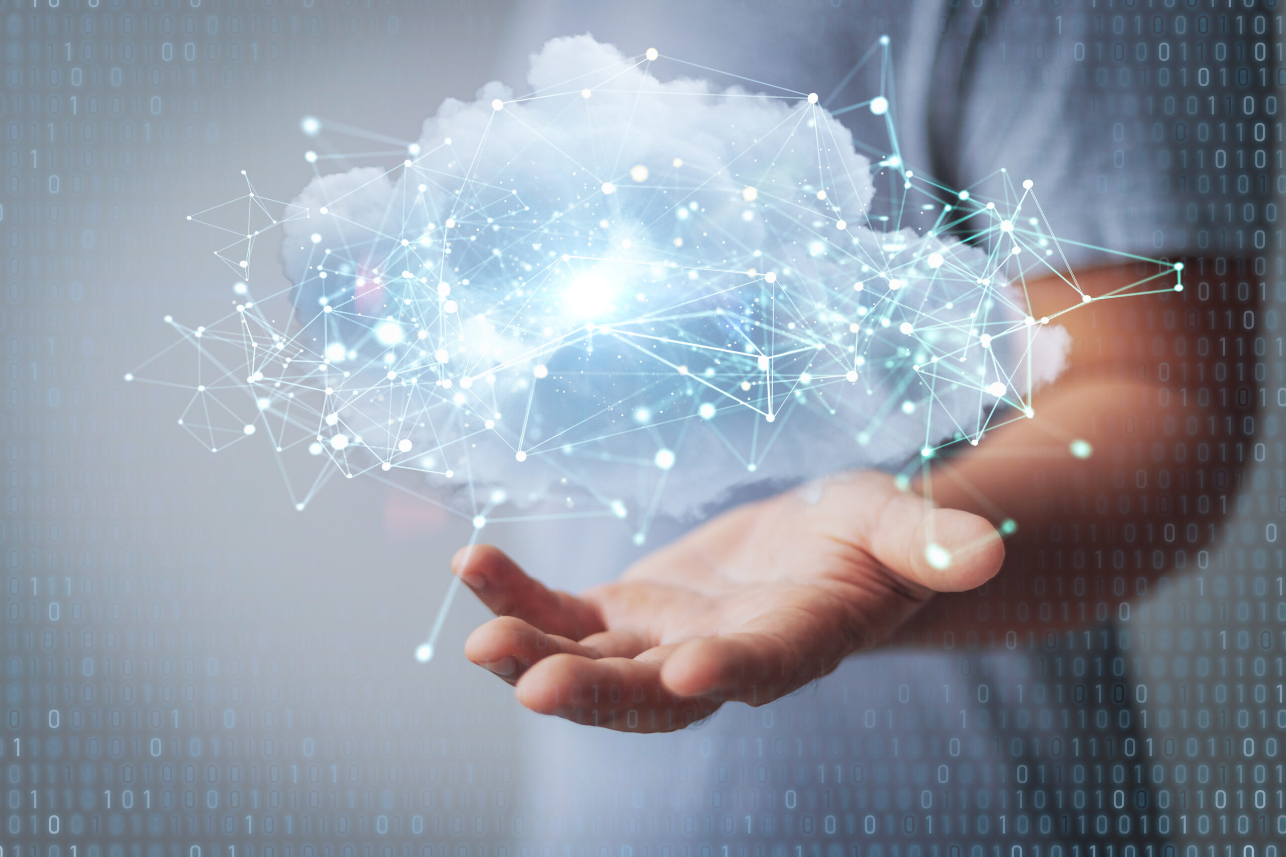 Eine visuelle Wolke mit vielen Verknüpfungspunkten schwebt über einer Hand